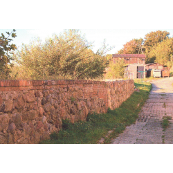Fragmenty murów obronnych z XIV w.